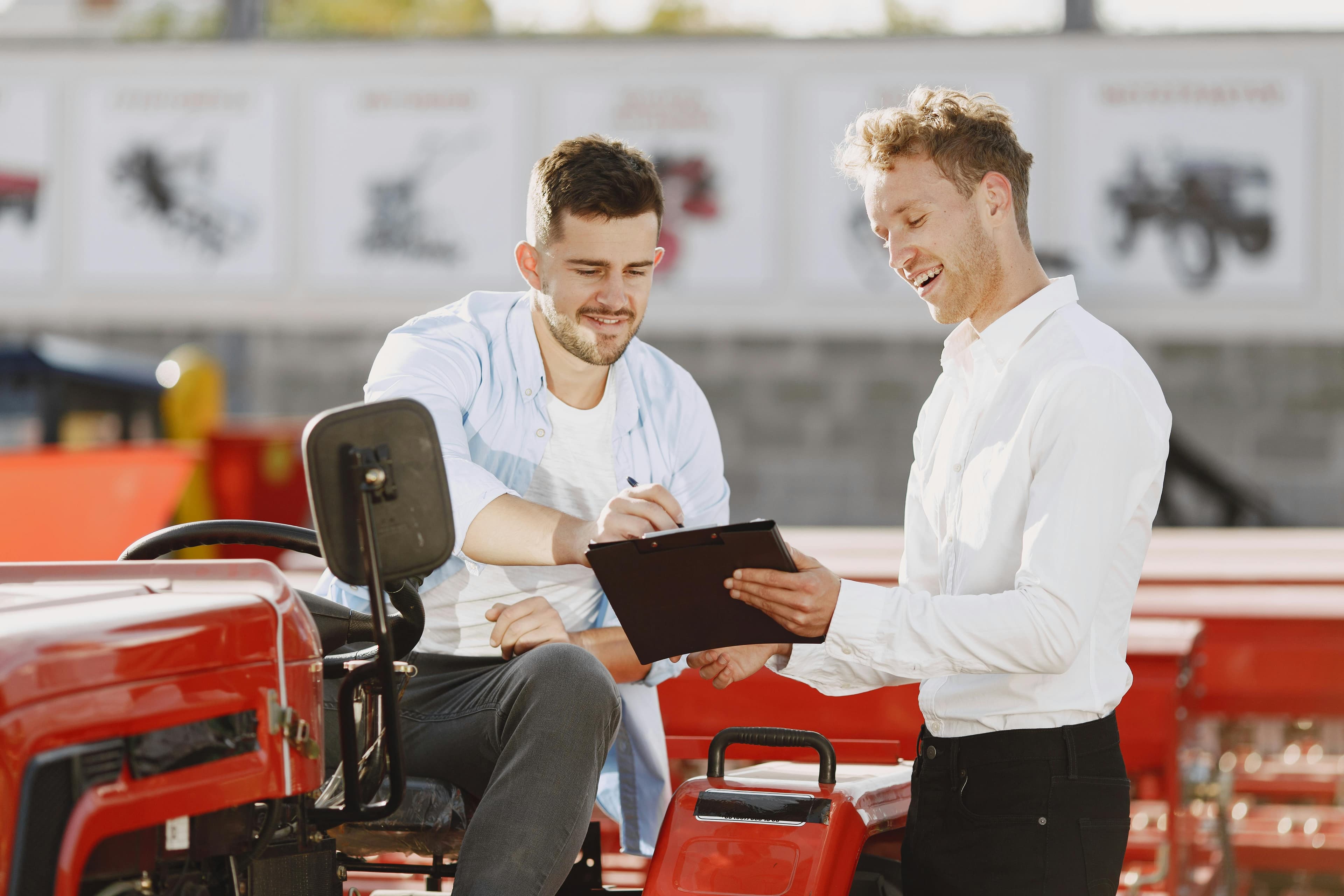 Two people discussing and working on Advanced technology in farming