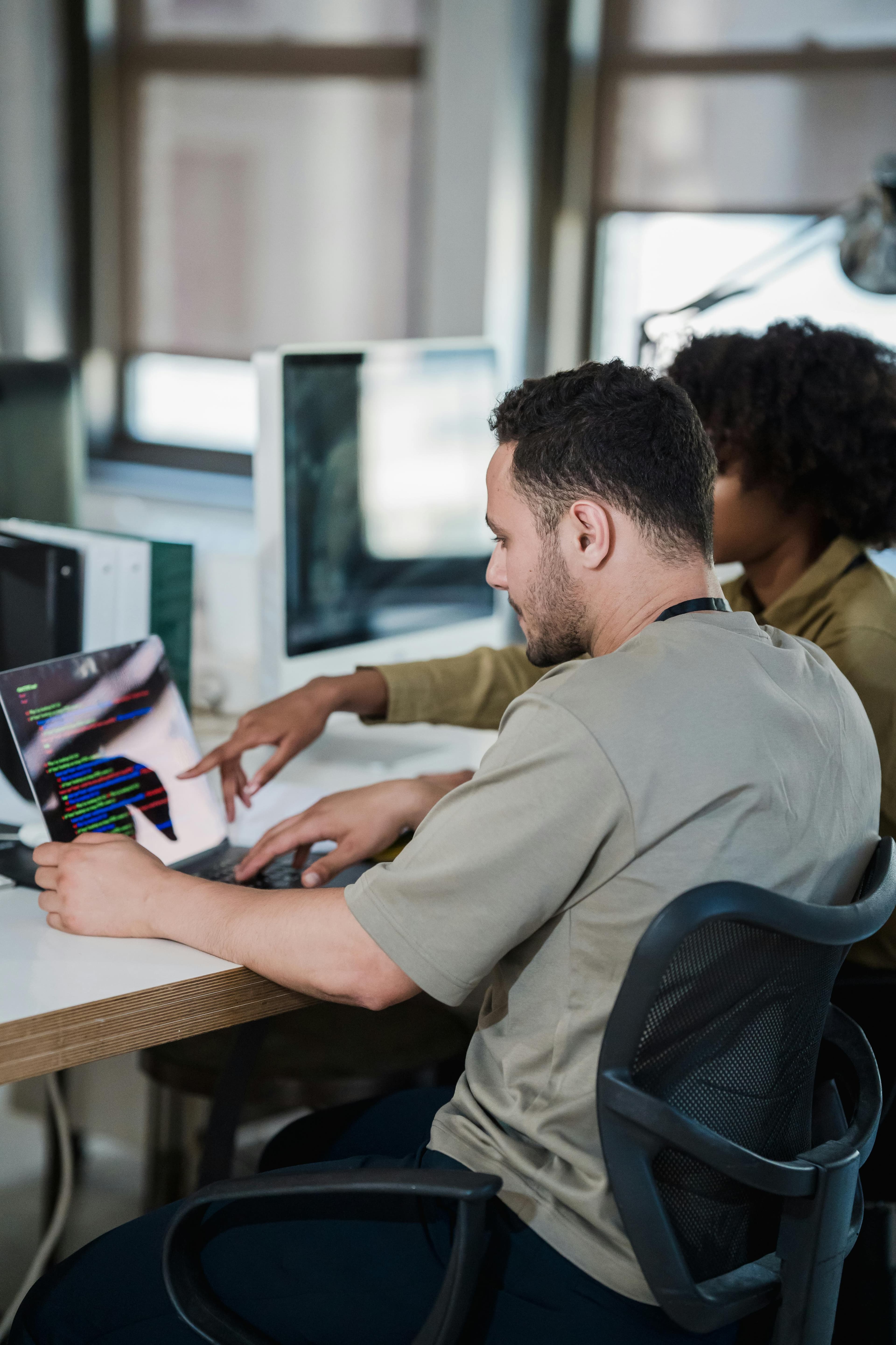 Two developers testing out LLMs for software development